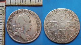 1723 - 1 shilling, stříbro - Jiří I., Velká Británie, SSC varianta byla ražena stříbrem objeveným South Sea Company v Indonésii