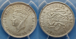 1938 - 5 piastres, stříbro - Britský Kypr, Jiří VI., kapsle PCGS AU55